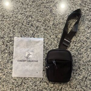 NWT.  Brand new, never used travel sling bag.